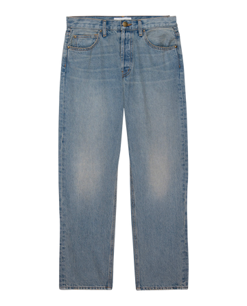 The Wayne Jean in Sedona Wash by THE GREAT. PF24 presents light blue denim jeans with a nostalgic roots flair, showcasing a classic straight-leg design, five pockets, and a button fly, all highlighted against a plain white background.