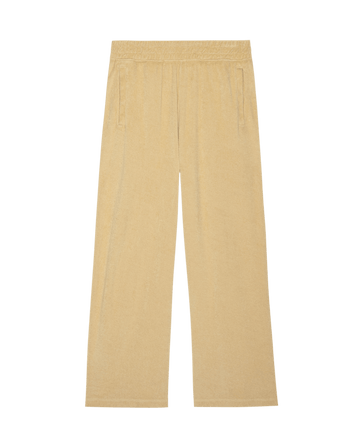 The Micro Terry Victory Sweatpant in Chamois by THE GREAT. SU25 MICRO TERRY features wide legs, an elastic waistband, side pockets, and soft microterry fabric, shown laid flat against a white background.