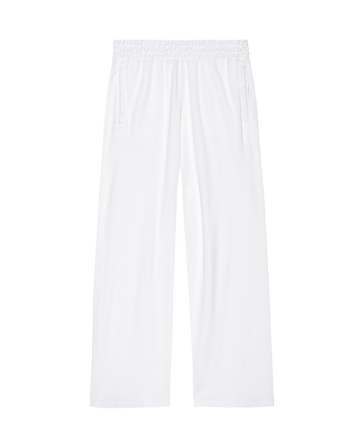 The Micro Terry Victory Sweatpant in True White by THE GREAT. SU25 MICRO TERRY features wide legs, soft microterry fabric, an elastic waistband, and side pockets, shown flat against a plain background.