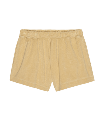 A pair of The Micro Terry Swing Short in Chamois by THE GREAT. SU25 MICRO TERRY, featuring an elastic waistband, displayed on a plain background.