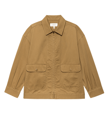 The Folsom Jacket – Tobacco by THE GREAT. F25 D1 is a light brown cotton twill jacket with a front zipper, two 1940s workwear-inspired buttoned flap pockets, and long sleeves, shown laid flat on a white background.