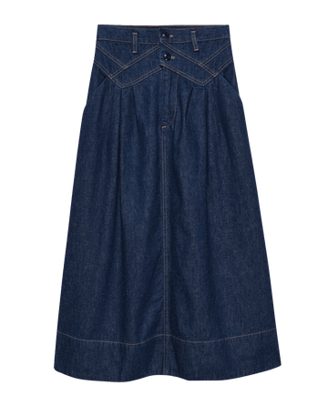 The Field Skirt – Midnight Rinse by THE GREAT. F25 D1: an A-line denim skirt with front pleats, double-button closure, belt loops, and contrast stitching for vintage utility style with timeless appeal.