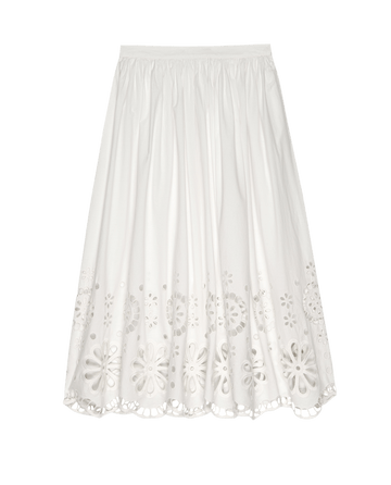 THE GREAT. SU25 Super Bloom Eyelet Skirt in White features an elastic waistband and intricate floral embroidery at the hem.