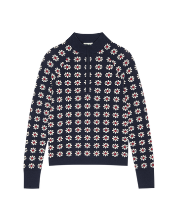 The Merino Quarter Zip by THE GREAT. F25 TGO in Frosted Daisy features a slim fit, navy blue hue, white and red floral pattern, ribbed collar, and partial front zipper—the ideal slopeside layer.