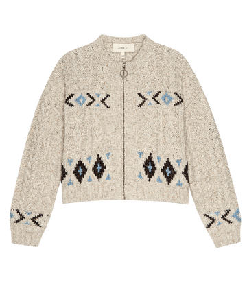 The Cavern Cardigan -- Oat by THE GREAT. PF25 is a beige knit zip-front cardigan with bold black and blue geometric patterns on the chest, sleeves, and hem.