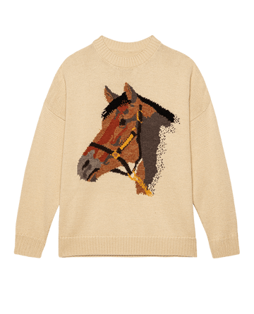 The Stable Pullover by THE GREAT. F25 D1 is a natural-toned, oversized knit crew sweater featuring a detailed horse-head intarsia on the front.