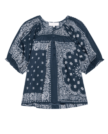 The Smocked Sleep Top by THE GREAT. F25 SLEEP features a navy blue bandana patchwork print, Victorian-inspired design, loose fit, and wide three-quarter sleeves.