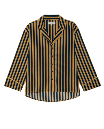 The Pajama Shirt – Club Stripe by THE GREAT. F25 SLEEP features long sleeves, a button-up front, vertical navy blue and mustard yellow stripes, a collar, and a curved hem.
