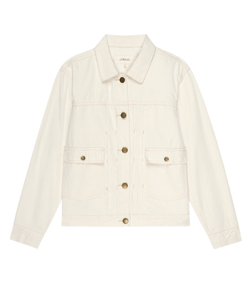 The Workwear Jean Jacket by THE GREAT. PS25 - Natural Hemp: A versatile denim jacket with a collar and long sleeves, featuring six brown buttons and two front pockets in a classic white design, adding refined workwear style to any outfit.