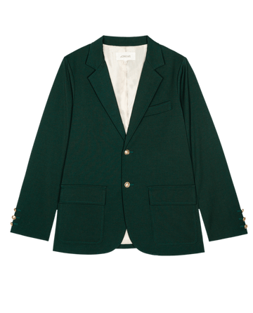 The Tailored Blazer in Winter Pine by THE GREAT. HOL 24 features gold buttons and two front pockets.