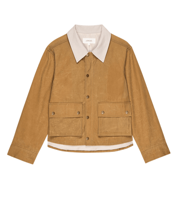 The Waxed Swingy Jacket in Walnut by THE GREAT. PS25 features a tan design with a contrasting light collar and two large front pockets with buttoned flaps, blending practicality with style.