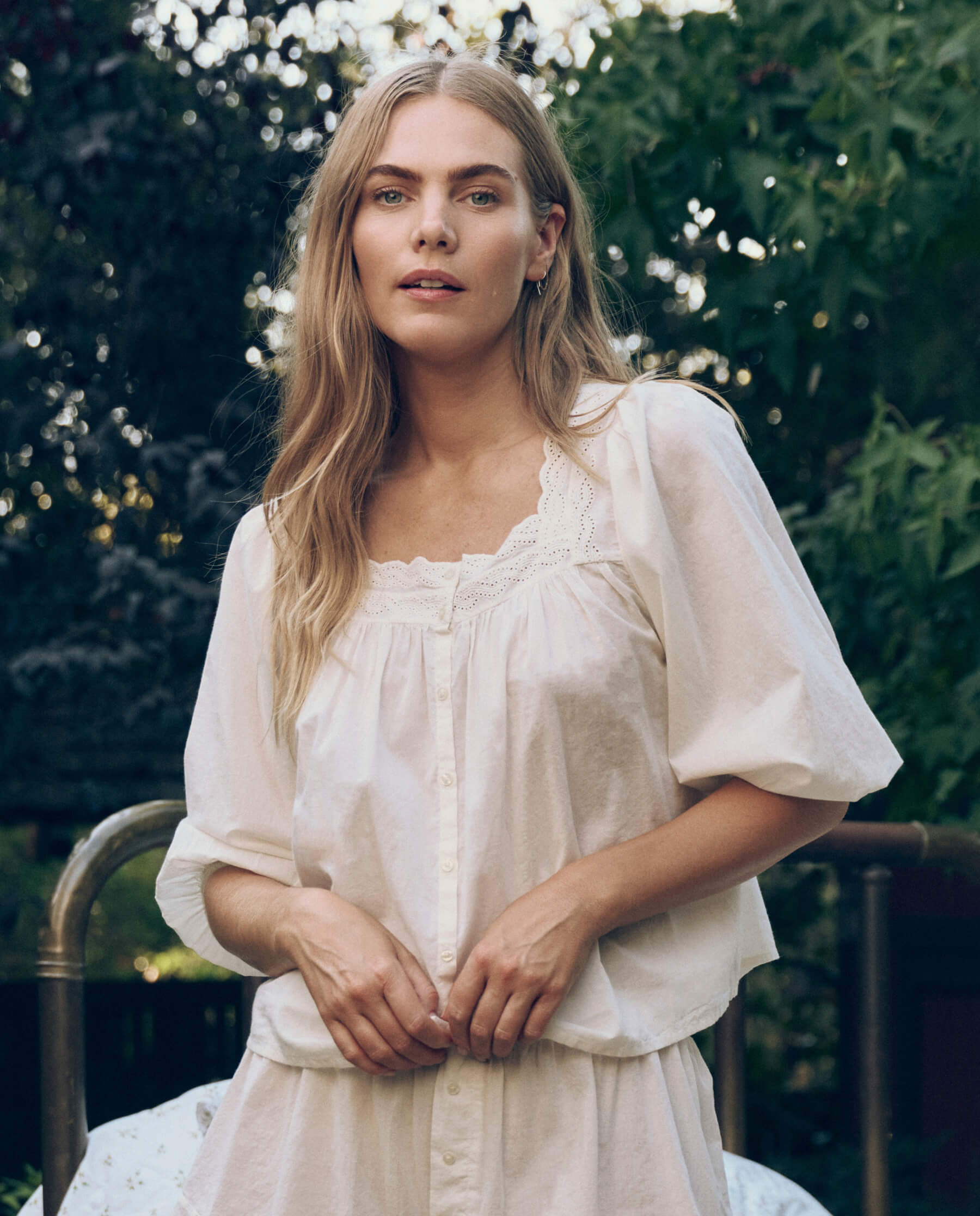 The Eyelet Button Sleep Top. -- True White – The Great.