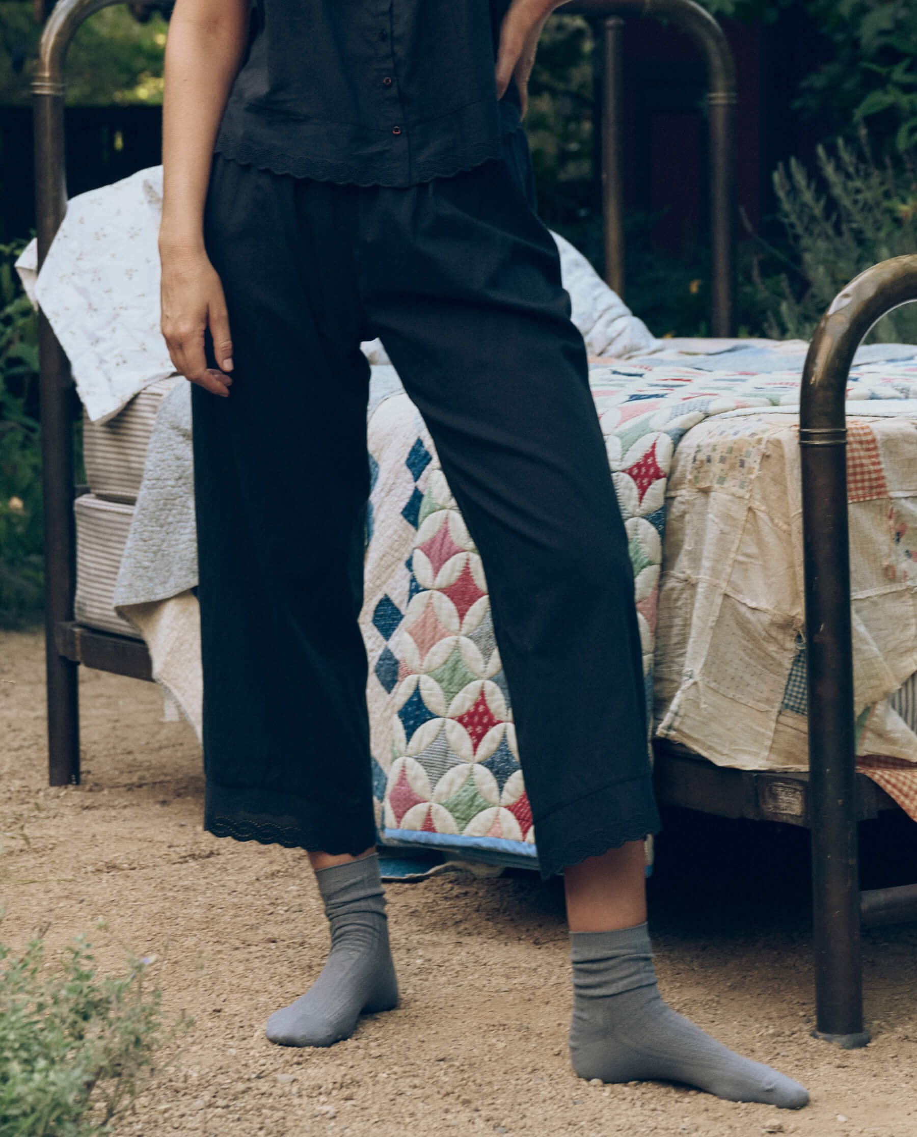 The Eyelet Easy Sleep Pant. -- Black – The Great.