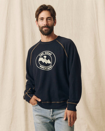 The Men's College Sweatshirt. Graphic -- Stargazer Blue with Mountain Resort Graphic SWEATSHIRTS THE GREAT. SP24 MEN