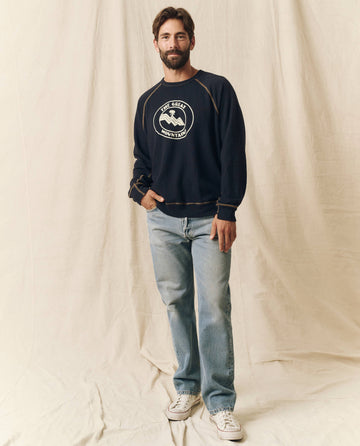 The Men's College Sweatshirt. Graphic -- Stargazer Blue with Mountain Resort Graphic SWEATSHIRTS THE GREAT. SP24 MEN