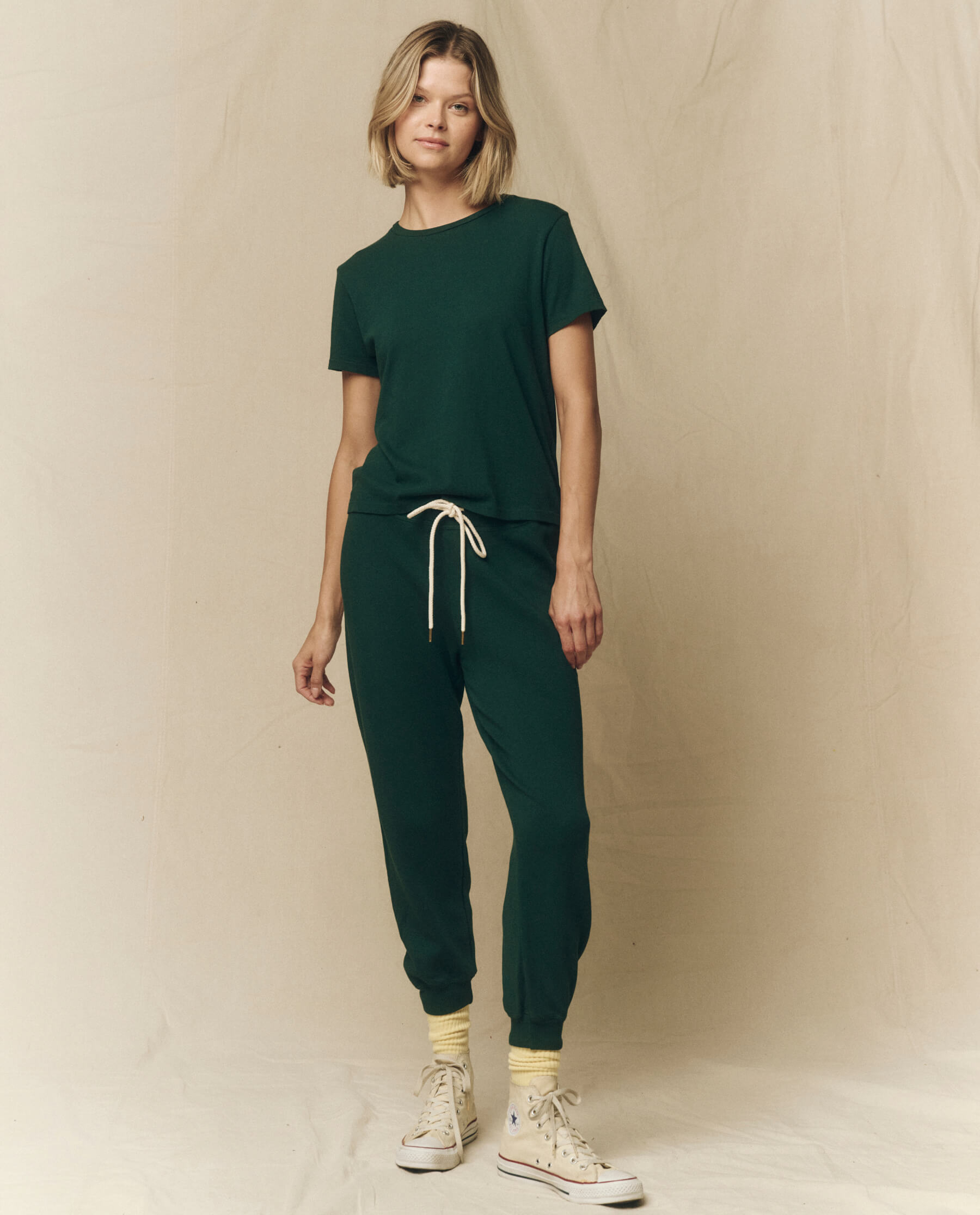 The Cropped Sweatpant. Solid -- Green Grove SWEATPANTS THE GREAT. FALL 23 KNITS