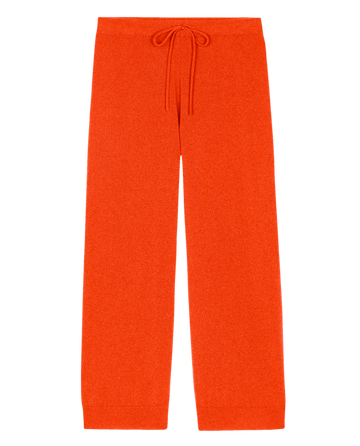 The Cashmere Lantern Pant in Ember by THE GREAT. HOL 24 CASHMERE, featuring a bright orange color and a drawstring waist, displayed on a plain background.