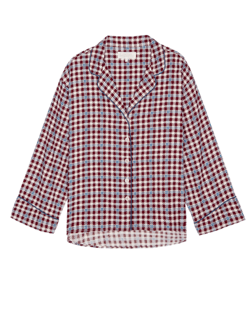 The Pajama Shirt by THE GREAT. HOL 24 SLEEP in Bordeaux Plaid featuring a collar and long sleeves on a plain background.