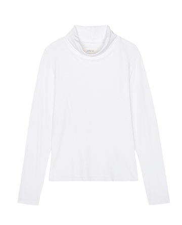 From THE GREAT. HOL 24 TURTLENECKS collection, The Turtleneck in True White showcases its timeless long-sleeve design gracefully against a plain backdrop.