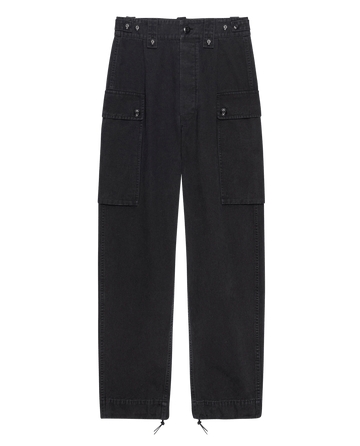 The Convoy Pant by THE GREAT. SP25 D1 are black men's cargo pants with multiple pockets and button details, elegantly set against a white background.