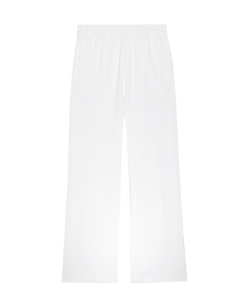 The Victory Sweatpant by THE GREAT. SP25 POLO LOUNGE in True White features a wide-leg design with an elastic waistband and side pockets, blending style and comfort for lovers of premium activewear, shown on a plain background.