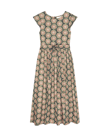 The Tulsa Dress by THE GREAT. SP25 D2 is a sleeveless, full-length fashion dress with the Heirloom Paisley print in black, white, and pink, featuring a fitted bodice and flared skirt that beautifully defines women's clothing trends.