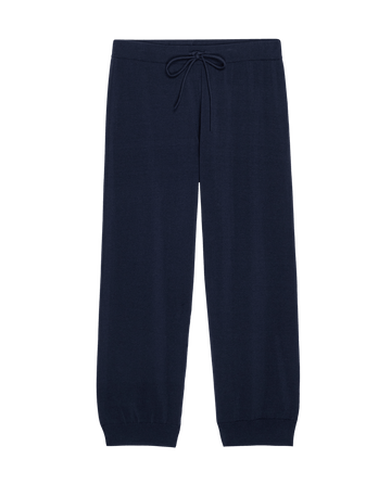 The Lantern Pant in Dark Navy by THE GREAT. SP25 HIGH TWIST YARN offers stylish comfort with an elastic waistband, drawstring tie, and cuffed ankles. Featuring no visible logos or patterns, these pants ensure a sleek look perfect for comfortable wear.