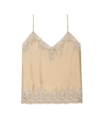 The Legacy Top by THE GREAT. SP25 COLLECTORS is a chic camisole in nude satin, featuring lace trim on the neckline and hem with thin spaghetti straps.