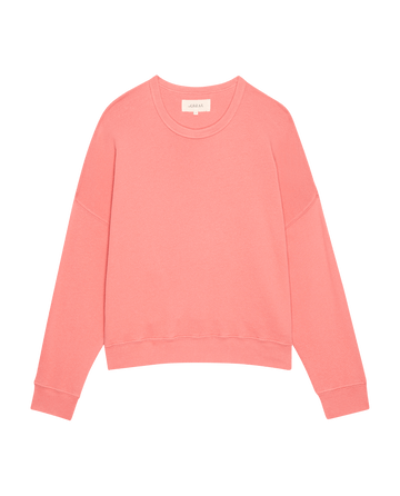 The Teammate Sweatshirt from THE GREAT. SP25 KNITS, in a striking Confetti shade, pops against the crisp white background.