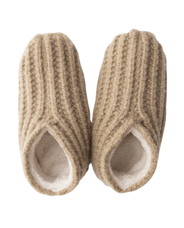 The Bootie Slipper in Camel by THE GREAT. HOL 24 SLEEP boasts a ribbed design and cozy sherpa lining, making it the perfect holiday gift, especially when viewed from above.