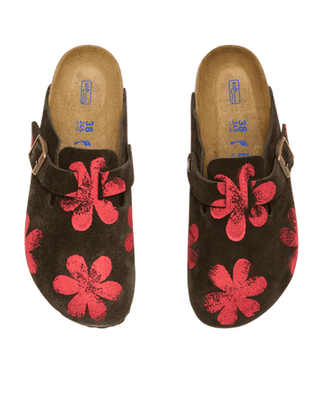 The Hand Stamped Boston Birkenstock in Mocha with Hot Red Daisy by THE GREAT. HOL 24 BIRKENSTOCK features exquisite hand-stamped designs, adjustable buckles, and a cushioned footbed.