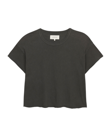 The Crop Tee in Washed Black by THE GREAT. CORE KNITS features a super soft, short-sleeve, crewneck design against a plain white background.