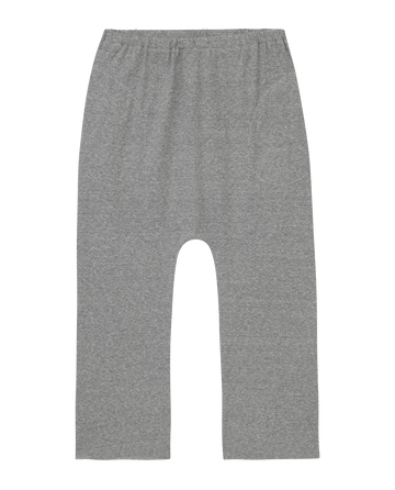 The Jersey Crop by THE GREAT. CORE KNITS in Heather Grey is laid flat against a white background, showcasing elastic-waist pants with a dropped rise and wider straight legs for ultimate comfort.