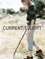 Person wearing a striped shirt and rolled-up jeans, standing outdoors in a grassy area, with "CURRENT/ELLIOTT" text overlay.