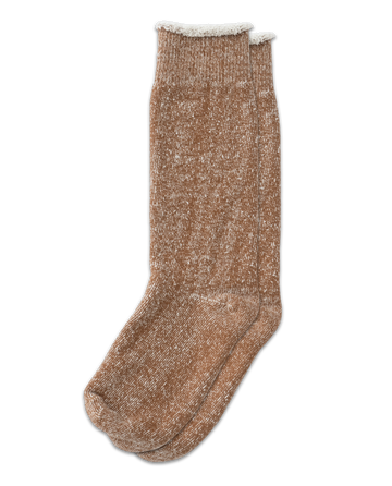 The Sweatshirt Sock in Nutmeg by THE GREAT. SP25 features a textured knit pattern, laid flat against a black background.
