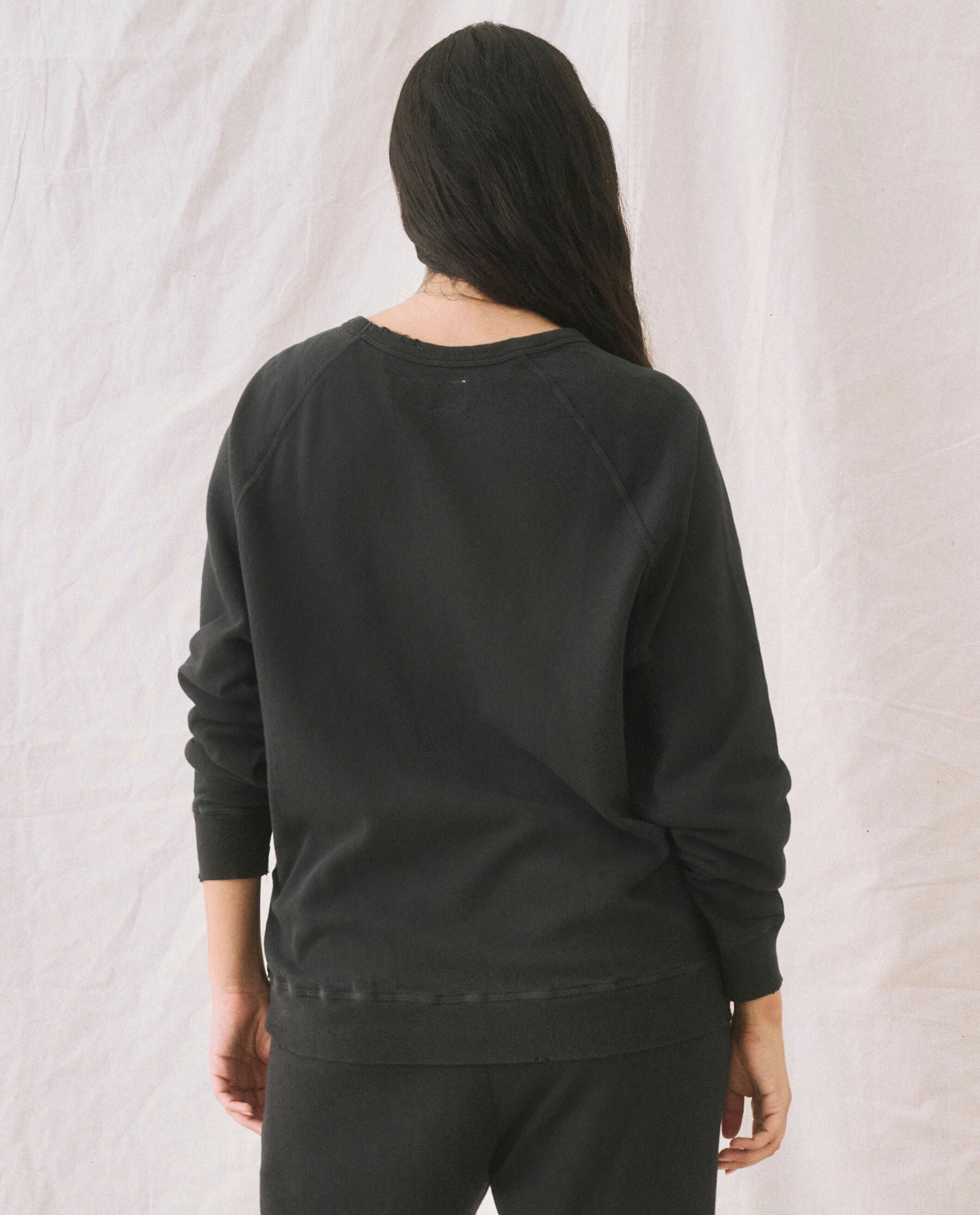 The College Sweatshirt. Solid -- Almost Black SWEATSHIRTS THE GREAT. CORE KNITS
