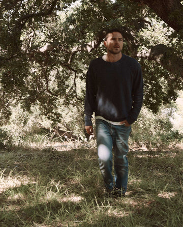 The Men's College Sweatshirt. -- WASHED NAVY SWEATSHIRTS THE GREAT. MAN.