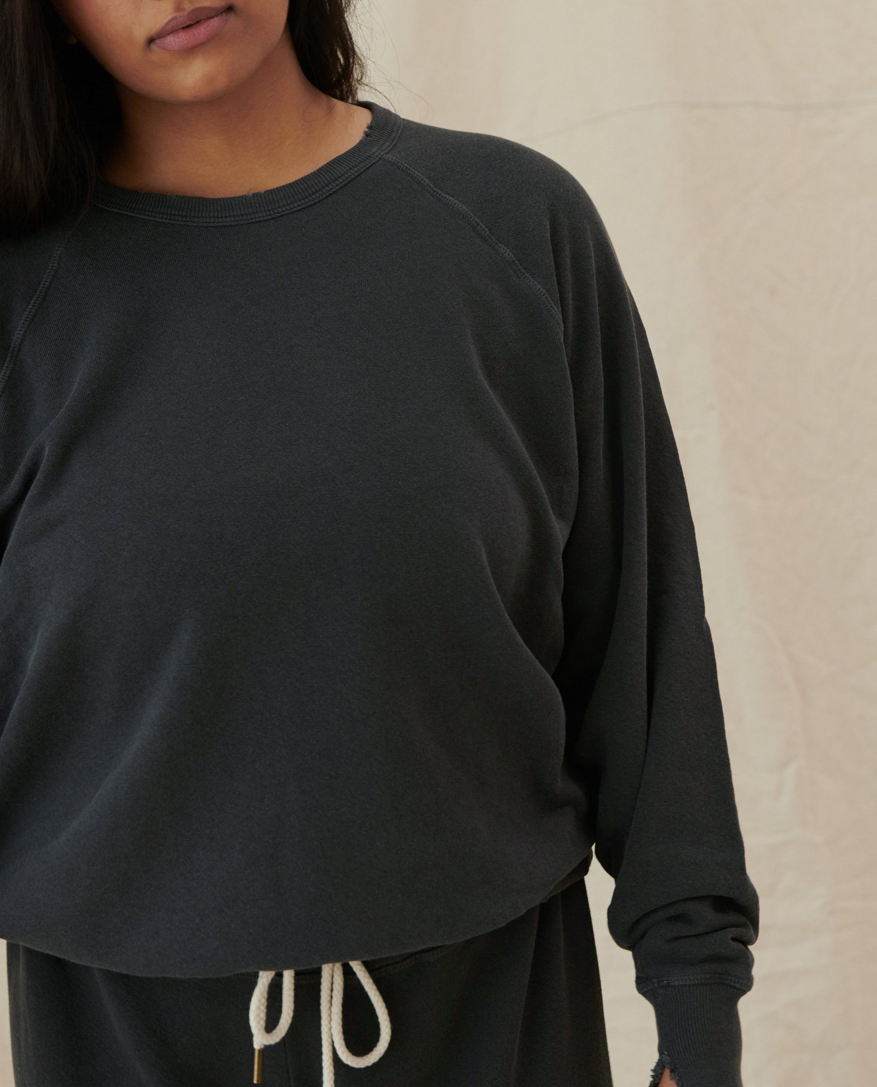 The College Sweatshirt. Solid -- Washed Black SWEATSHIRTS THE GREAT. CORE KNITS