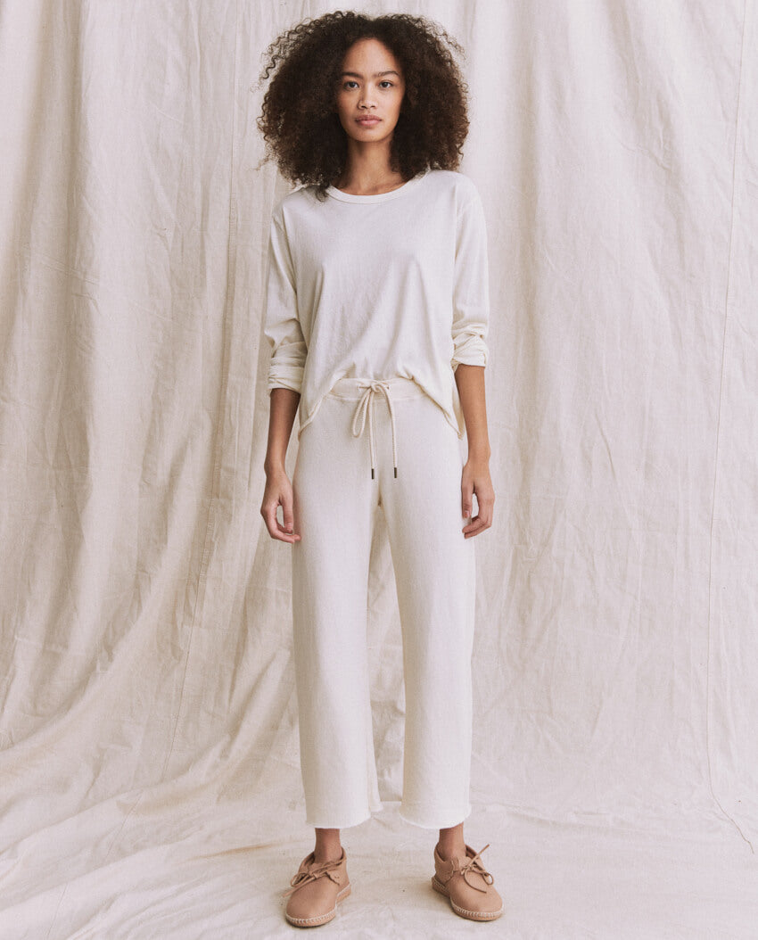 The Wide Leg Cropped Sweatpant. -- WASHED WHITE SWEATPANTS THE GREAT. CORE KNITS