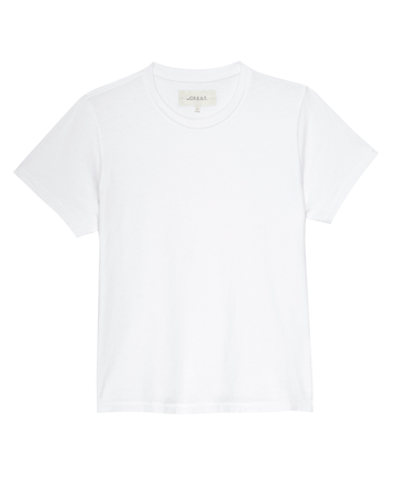 The Little Tee in True White by THE GREAT. SP22 APRILCAP is a 100% cotton, short-sleeve t-shirt with a round neckline, perfect as a layering piece, displayed against a white background.