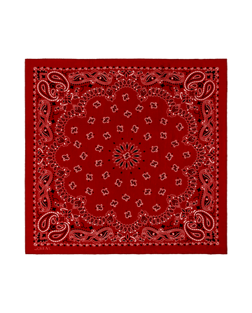 The Silk Bandana by THE GREAT. F25 COLLECTORS in True Red features a white and black paisley and floral border on luxurious, lightweight silk, capturing the vintage charm of classic bandanas. Displayed on a white background.