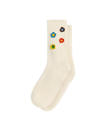 THE CROCHET FLOWER SOCK (4 FLOWERS) in cream by EMME features off-white ribbed cotton and four small, colorful hand-crocheted flowers near the top for a vintage-inspired look.