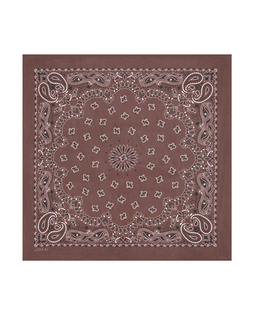 The Silk Bandana in Chocolate by THE GREAT. F25 COLLECTORS features a vintage-inspired brown design with classic white paisley and floral patterns along the border and center.