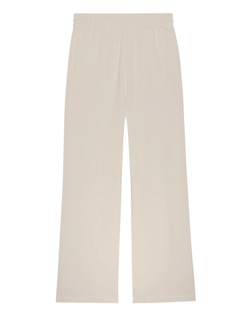 The Fleece Victory Sweatpant by THE GREAT. H25 CORE FLEECEBACK in washed white features a wide-leg design, elastic waistband, and side pockets, shown laid flat on a white background.