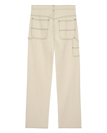 The Mill Jean by THE GREAT. PS26 in natural with navy stitching features a straight-leg workwear design, two large back pockets, and a side utility pocket, shown flat on a white background.