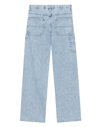 Light blue The Mill Jean in Dakota Wash by THE GREAT. PF25, shown from the back with two large back pockets, a side utility pocket, and straight wide legs.