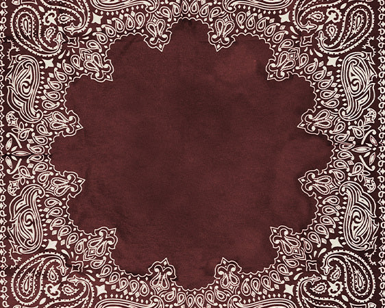 A maroon bandana with intricate white paisley patterns along the edges and a scalloped central border design.