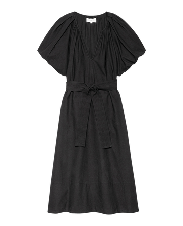 The Fairground Dress in black by THE GREAT. F25 D2 features short wide puffed sleeves, a V-neckline, and a matching fabric belt at the waist, shown against a plain white background.