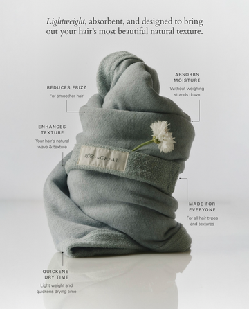 The RŌZ + The GREAT The Sweatshirt Hair Towel in Seaglass by THE GREAT. PF25 ROZ wraps hair softly to reduce frizz, enhance texture, dry quickly, absorb moisture, and is perfect for all hair types.
