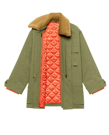 THE GREAT. F25 D1's The Quilted Liner Parka – Army with Hot Orange features utility pockets, a tan removable faux fur collar, and a bright orange quilted lining, shown open to reveal interior details.
